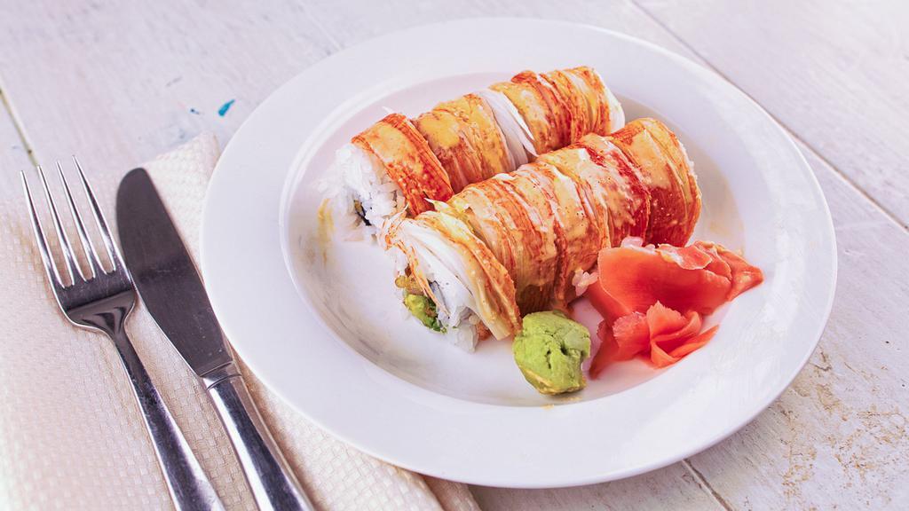 Tokyo Roll · Shrimp tempura, avocado. Topped with crabstick, spicy mayo.