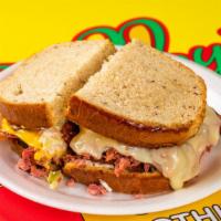 Ultimate Bobby'S Corn Beef · Fresh sliced corned beef, beef pastrami, beef bacon, coleslaw, thousand island or Russian dr...