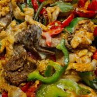 Chapala Special · Grilled steak, chicken and shrimp, with bell peppers, tomatoes, and onions, covered with che...