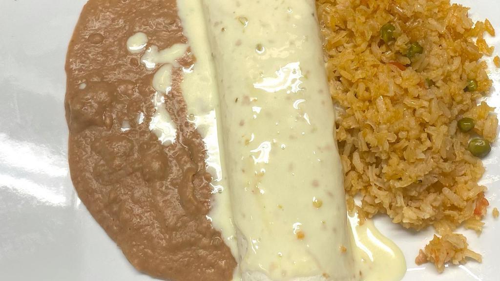 Pn Burrito, Rice And Beans · For kids twelve and under. Plate includes a small drink.