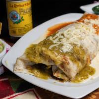 Big Mambo Burrito · A large flour tortilla with fajita, chicken or steak, grilled veggies, red sauce, green sauc...