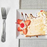 Tres Leches Cake · Delicious sweet vanilla sponge cake soaked in our sweet tres leches sauce and topped whipped...