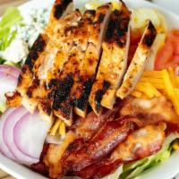 Wisconsin Cobb Salad · Grilled chicken, Avocado, Bacon, Diced eggs, Red Onion, Tomatoes, Blue cheese & Cheddar chee...