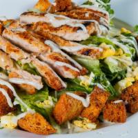 Classic Caesar Salad  · Chopped Romaine with Creamy Caesar Dressing, Chopped Eggs, Croutons and Parmesan.