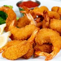 Shrimp Basket · Large Shrimp Deep Fried to a Golden Brown and Served with Choice of SIde.