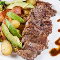 Steak, Avocado And Potatoes · A frizzle-fried steak flanked with baby potatoes and brussels sprouts. Topped with bacon and...