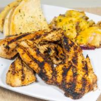 Turkey Chops (Grilled Or Fried) · Served with Urban bread, Urban potatoes, salad.