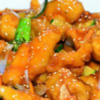 Sesame Chicken · Breaded chicken with mixed vegetables in sesame sauce.