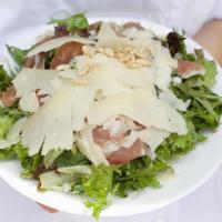 Large Emilia Salad · GF | Serves 1-2 | Mixed greens, prosciutto, red onion, pine nuts, Grana Padano and garlic ba...