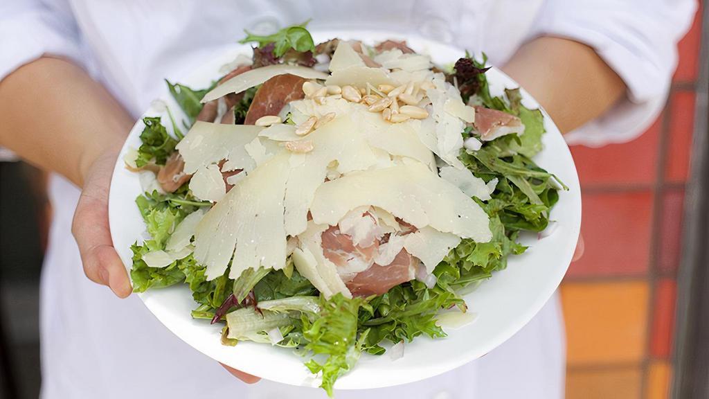 Large Emilia Salad · GF | Serves 1-2 | Mixed greens, prosciutto, red onion, pine nuts, Grana Padano and garlic balsamic dressing.