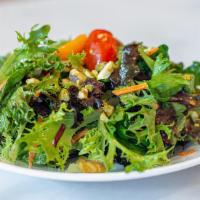 House Salad · GF, Vegan | Mixed greens, julienne carrots, cherry tomatoes, pistachios and house vinaigrett...