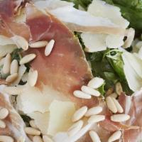 Family Emilia Salad · GF | Serves 3-4 | Mixed greens, prosciutto, red onion, pine nuts, Grana Padano and garlic ba...