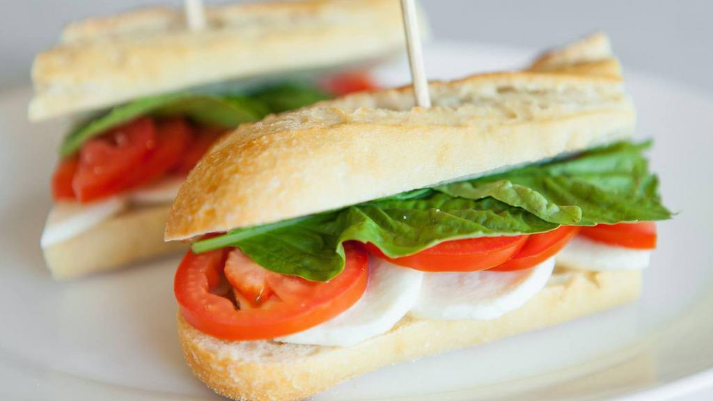 Caprese Sandwich · V | Fresh mozzarella, fresh basil, sliced tomato and olive oil.