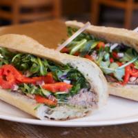 Pan Bagna Sandwich · DF | Tuna, kalamata olives, capers, red onion. roasted red peppers, arugula and olive oil.