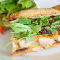 Grilled Chicken Sandwich · Served Hot | Grilled chicken, provolone, roasted red pepper, mixed greens, and basil pesto a...