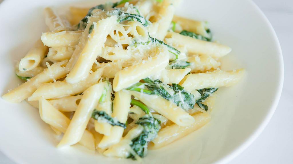 Penne Gorgonzola · V | Penne pasta tossed with spinach and creamy gorgonzola sauce.