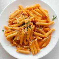 Penne Rosmarino · V | Penne pasta in our housemade rosemary insfused pink sauce.