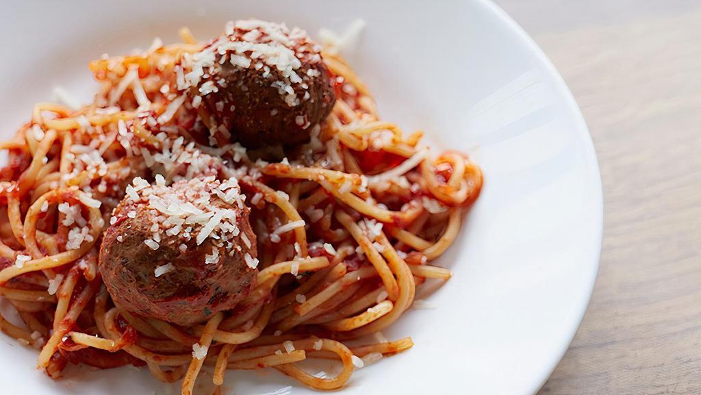 Kid'S Spaghetti & Meatballs · Spaghetti topped with two meatballs, Sugo Betti sauce, and Grana Padano cheese.