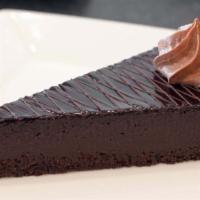 Bestia Nera · GF | Flourless chocolate cake topped with a chocolate glaze.