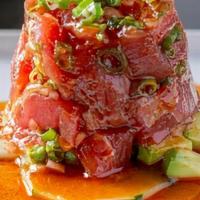 Tuna Bite · freshly dressed tuna in spicy ponzu sauce, scallion, avocado, shallot.