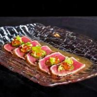 Seared Tuna-Roe · seared garlic pepper tuna, scallion and salmon roe. (5 Pcs.)