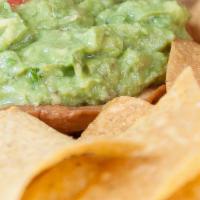 Guacamole · Fresh avocados blended with tomato, cilantro, onions, and abi’s spices. Served with corn tor...