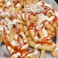 Papas Guanacas  · French fries topped with ketchup, mayo and cheese