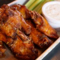 Wings · 1 pound of fresh jumbo wings tossed in your choice of buffalo, BBQ, Honey BBQ, Angry Sauce o...