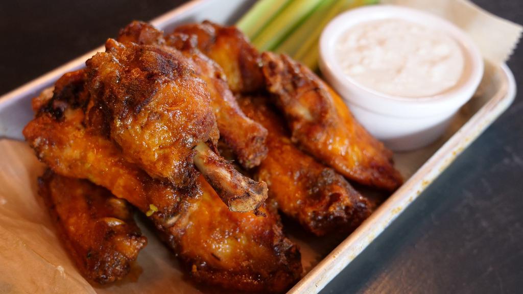 Wings · 1 pound of fresh jumbo wings tossed in your choice of buffalo, BBQ, Honey BBQ, Angry Sauce or plain. Your choice of ranch or blue cheese.