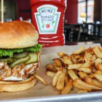 Smothered Ranch Chicken Sandwich · Hand breaded chicken breast fried and smothered in house made ranch dressing then topped wit...