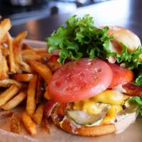 Bacon Cheeseburger · Two 3-ounce hand patted smash burgers topped with smokehouse bacon American cheese, leaf let...