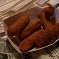 Mozzarella Sticks · Six pieces of batter-dipped mozzarella sticks fried golden brown and served with your choice...