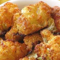 Breaded Cauliflower · A touch of cheddar, lightly battered and fried to perfection.