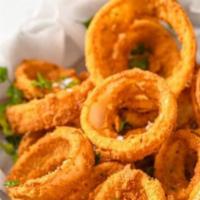 Onion Rings · Sweet onion sliced and dipped in beer batter and fried golden brown.