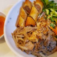 Bun Bo Xao( Satay Beef) · Satay beef. served with vegetables, eggroll, vermicelli noodles and sauce. It's a Vietnamese...