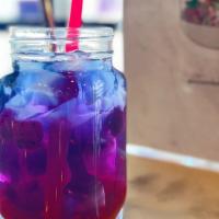 Dragon Passion Tea · A special tea that has 3 layers of color which mixes into a vibrant violet color when stirre...
