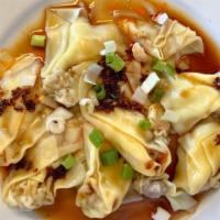 Spicy Wonton · Spicy. Hot & Spicy. 
Pork-filled wontons served in a hot and spicy sauce, garnished with sca...