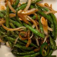 Szechuan Green Beans · Spicy. Hot & Spicy. 
Sautéed with onion and sliced garlic in a spicy brown sauce