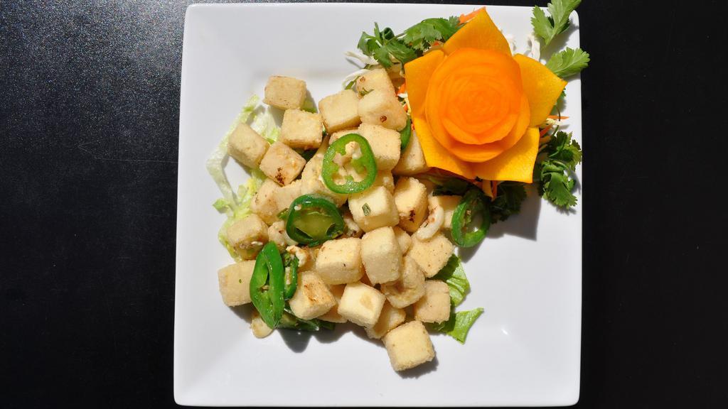 Salt & Pepper Tofu · Spicy. Hot & Spicy.
Soft tofu dipped in batter and fried sautéed with jalapeño