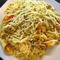 Singapore Rice Noodle · Spicy. Hot & Spicy.
Stir-fried rice noodles in spicy curry sauce with shrimp and chicken. Se...