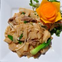 Cantonese Chow Fun · Stir-fried wide rice noodles with bok choy, onion, snow pea, and bamboo shoot