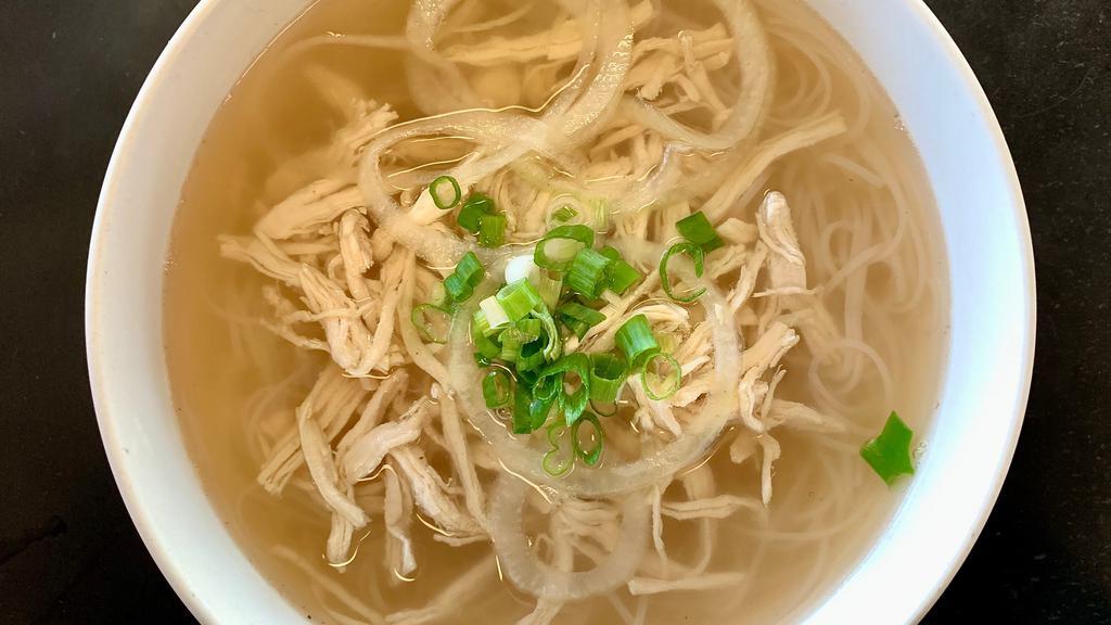 Pho Ga（越南鸡肉粉） · Shredded chicken breast served in our homemade beef broth, rice noodles, onions, and garnished with scallion