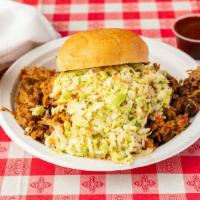 Southern Style Sandwich (12 Oz) · Large sandwich with pulled pork topped with coleslaw and sauce. Served on a toasted Kaiser R...