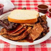 Combo Plate · Beef, burnt ends, and ribs. Served with one side dish and bread.