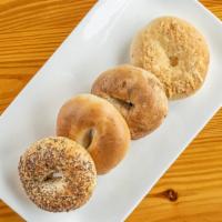 Bagel  + Cream Cheese · Your  Choice Bagel + your Choice Cream  Cheese