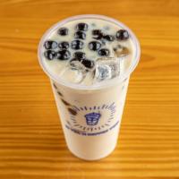 Green Milk Tea · Our green tea steeped with non-dairy creamer, shaken with ice, and completed with our carame...