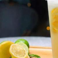 Lemon Boom · This green tea shaken with a freshly squeezed lemon, a hint of honey, and finished with a sl...