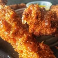 Honey Chicken Tenders · 5 Made from Scratch Buttermilk Marinated Chicken Tenders/Strips, Hand Breaded!  Tossed in a ...