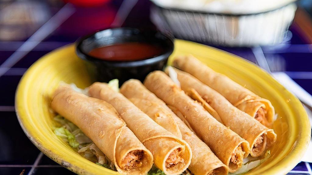 Taquitos · Six crispy rolled corn tortillas filled with chicken and cheese. Served with ranchero sauce.