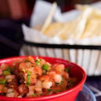 Pico De Gallo · Our famous recipe is made fresh daily with chopped tomatoes, onions, peppers, and cilantro. ...